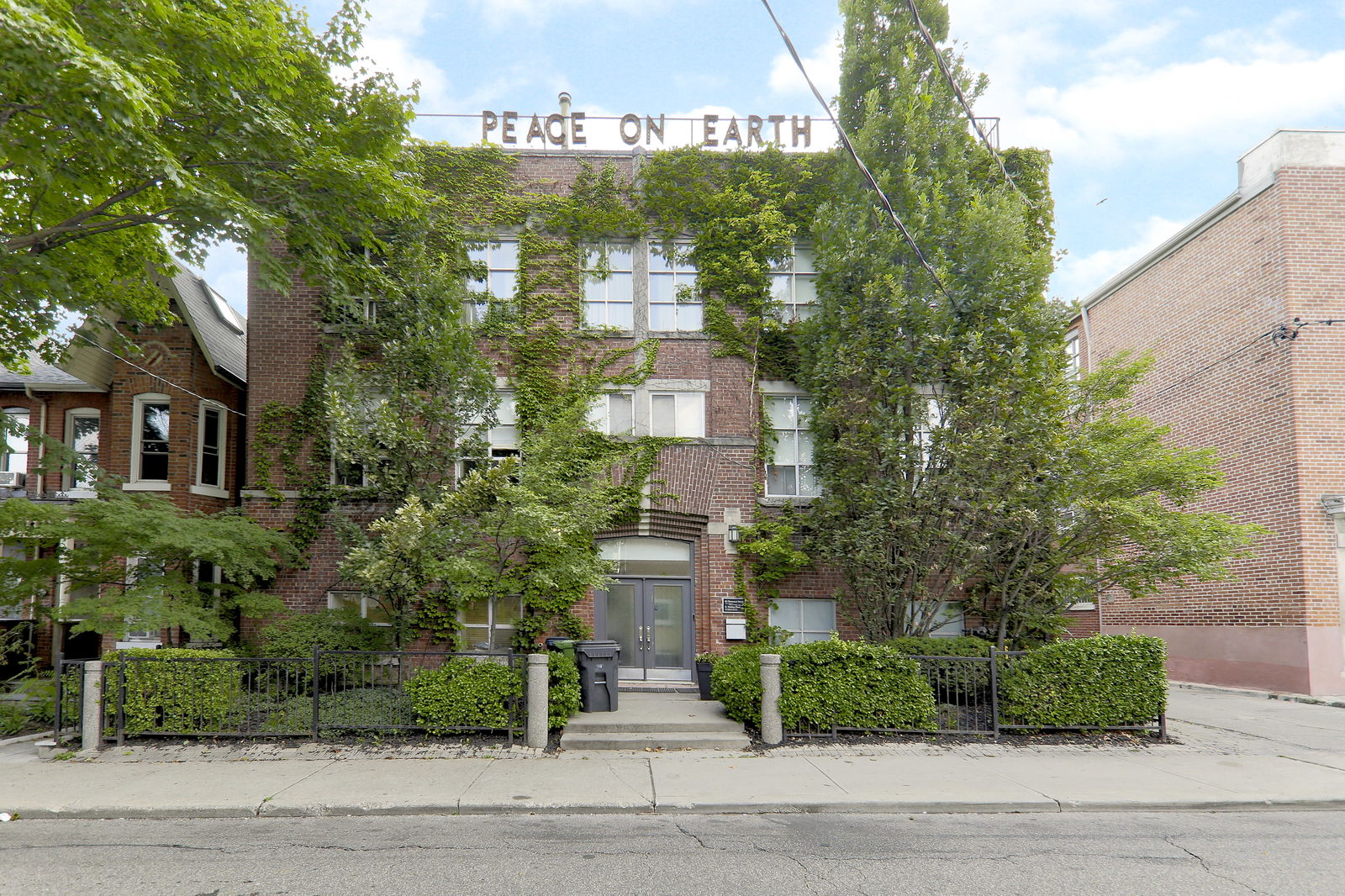 Exterior Facade — Claremont Lofts, West End, Toronto