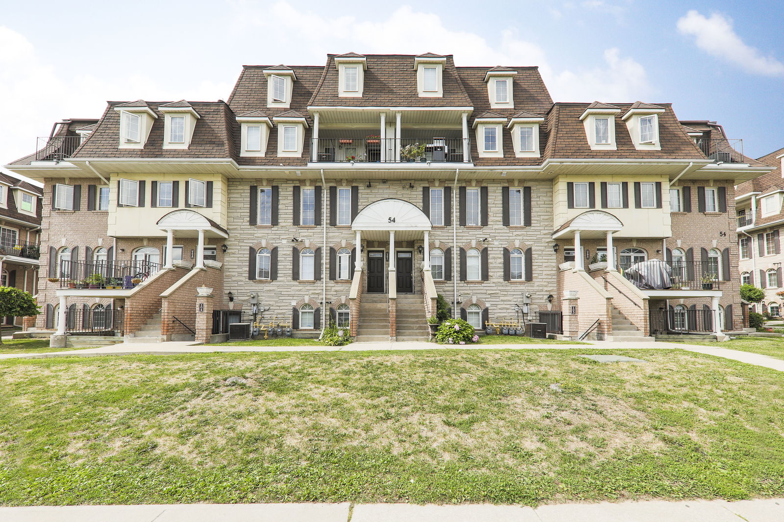 Exterior Facade — Sidney Belsey Crescent Townhomes, York Crosstown, Toronto